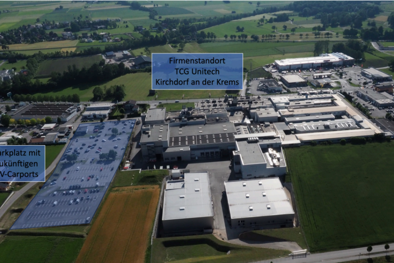 Luftaufnahme eines Industriekomplexes mit eingezeichneten Flächen für ein Unternehmen und zukünftige Solarcarports.